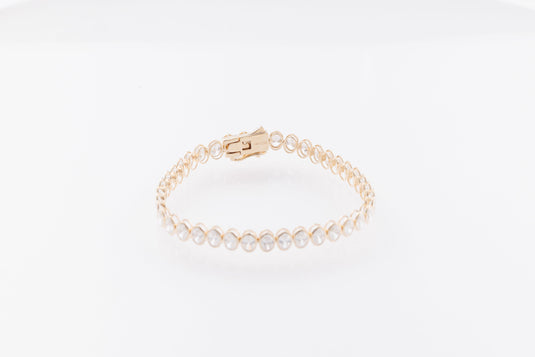 10.57ctw Oval Cut Lab-Grown Diamond Bezel Tennis Bracelet in 14K Yellow Gold